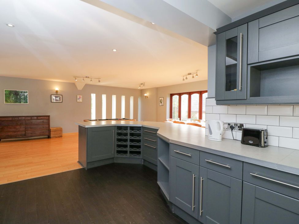 A kitchen with cabinets and appliances at Lady Of Lourdes in Whitchurch, Herefordshire