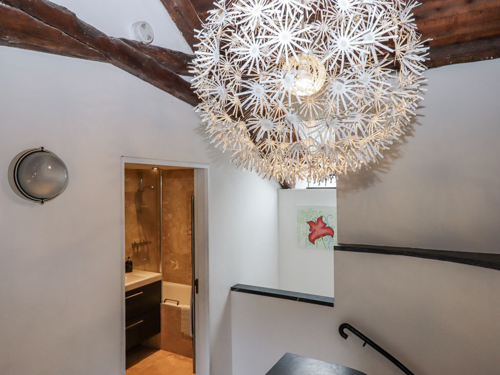 A bathroom with a shower and sink at Clifford Lodge Barn