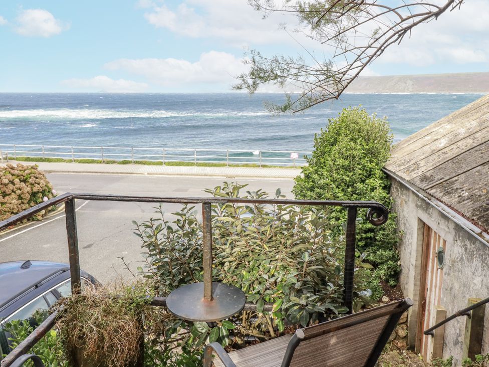 A view of the ocean from a balcony at Cove Retreat in Penzance