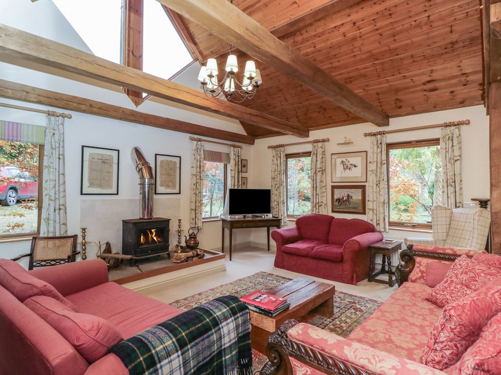 A living room with sofas and a fireplace at Gardeners Hill Annex 