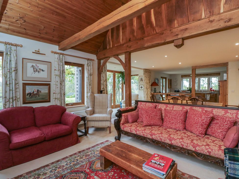 A living room with sofas and a coffee table at Gardeners Hill Annex