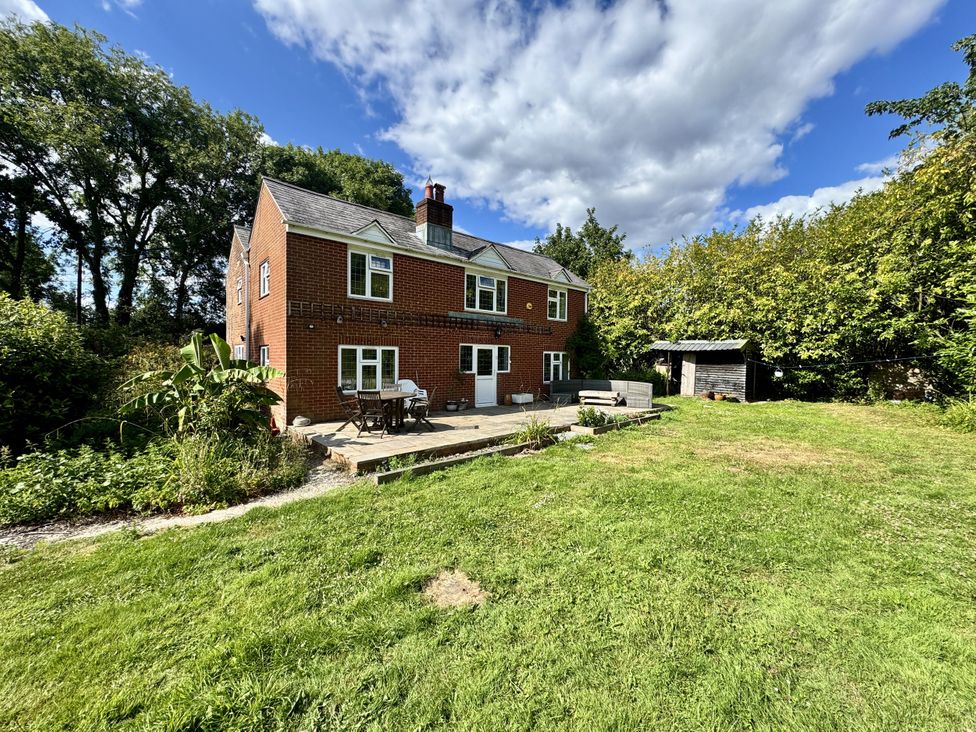 A house with a garden and patio at Forest Break in Southampton