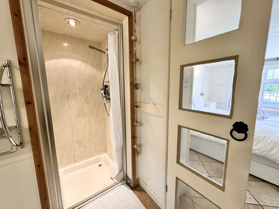 A shower in a bathroom at Forest Break in Southampton