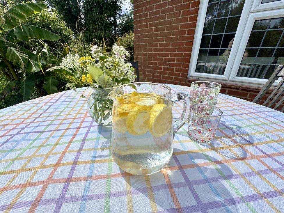 A pitcher with lemon slices on a table at Forest Break in Southampton