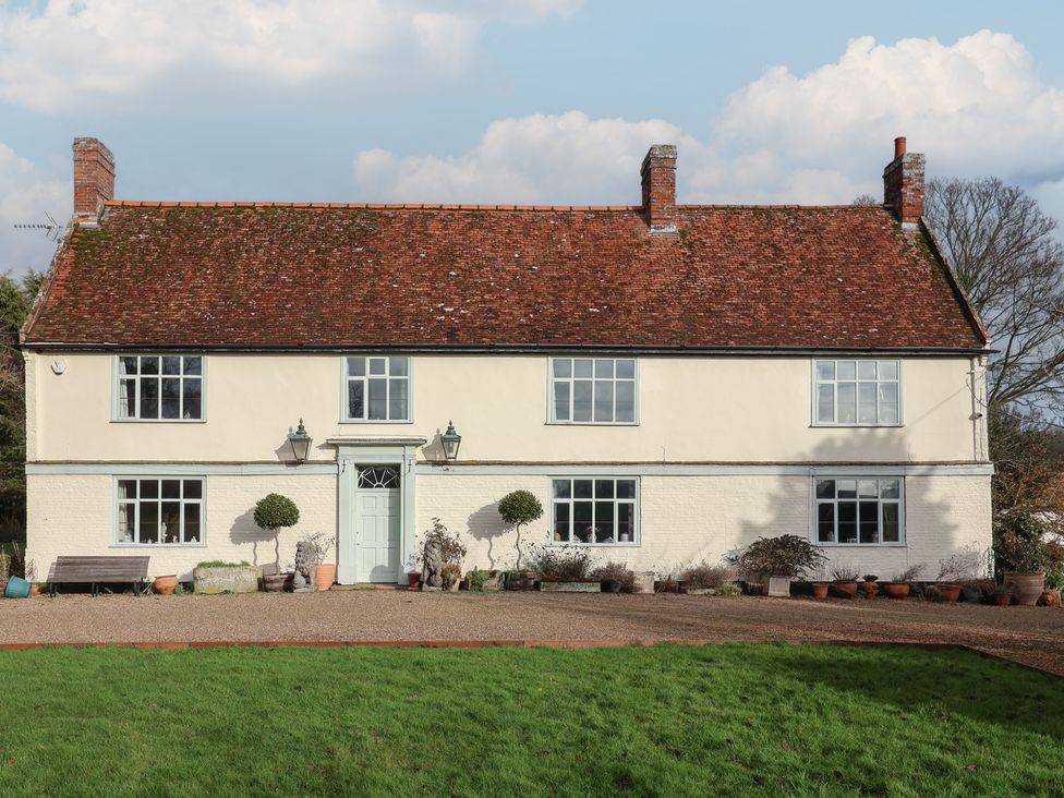 A house with windows and a pathway at Farmhouse in Beccles