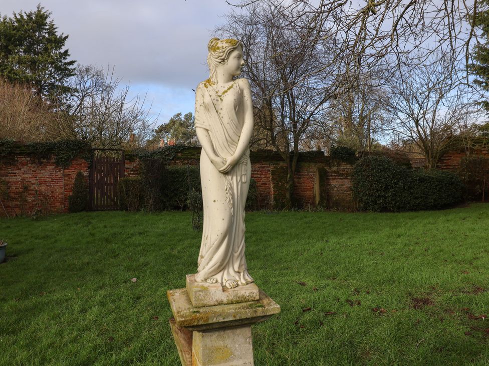 A statue in a garden at Farmhouse in Beccles
