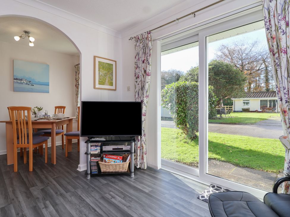 A dining room with a table and chairs at Westview in Liskeard