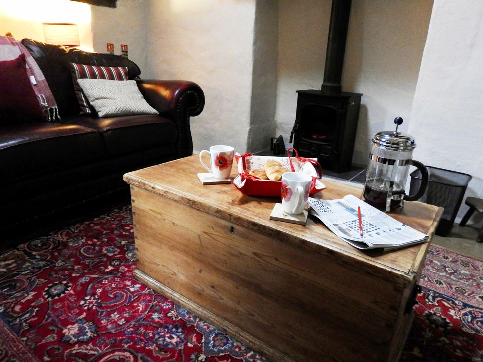 A living room with a sofa and coffee table at Butterslade