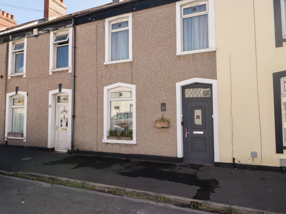 A house facade with two doors and windows at 18 Kent Street Cardiff