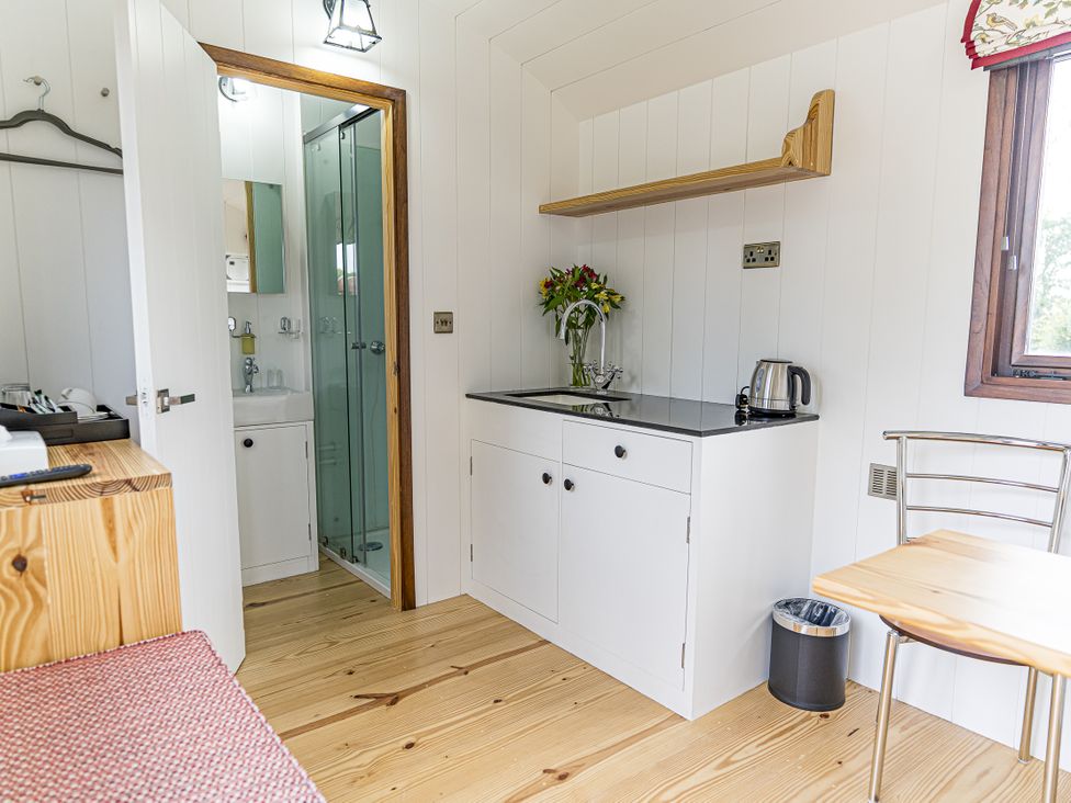 A kitchen with a sink and kettle at No 1 The Orchard Upton Warren