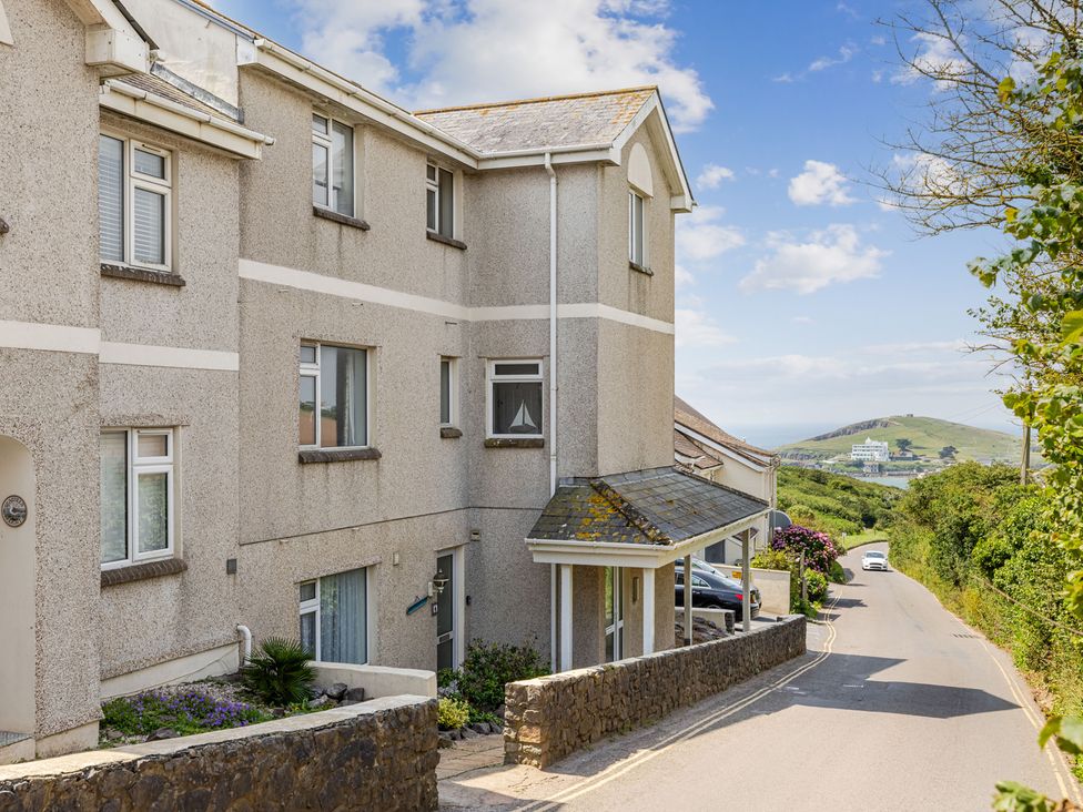 An outdoor view of a building on a road at 6 Avon Quillet Bigbury-On-Sea