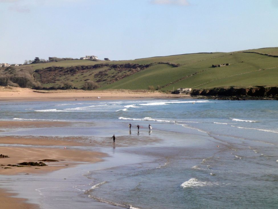 A beach with people walking near the water at 6 Avon Quillet Bigbury-On-Sea