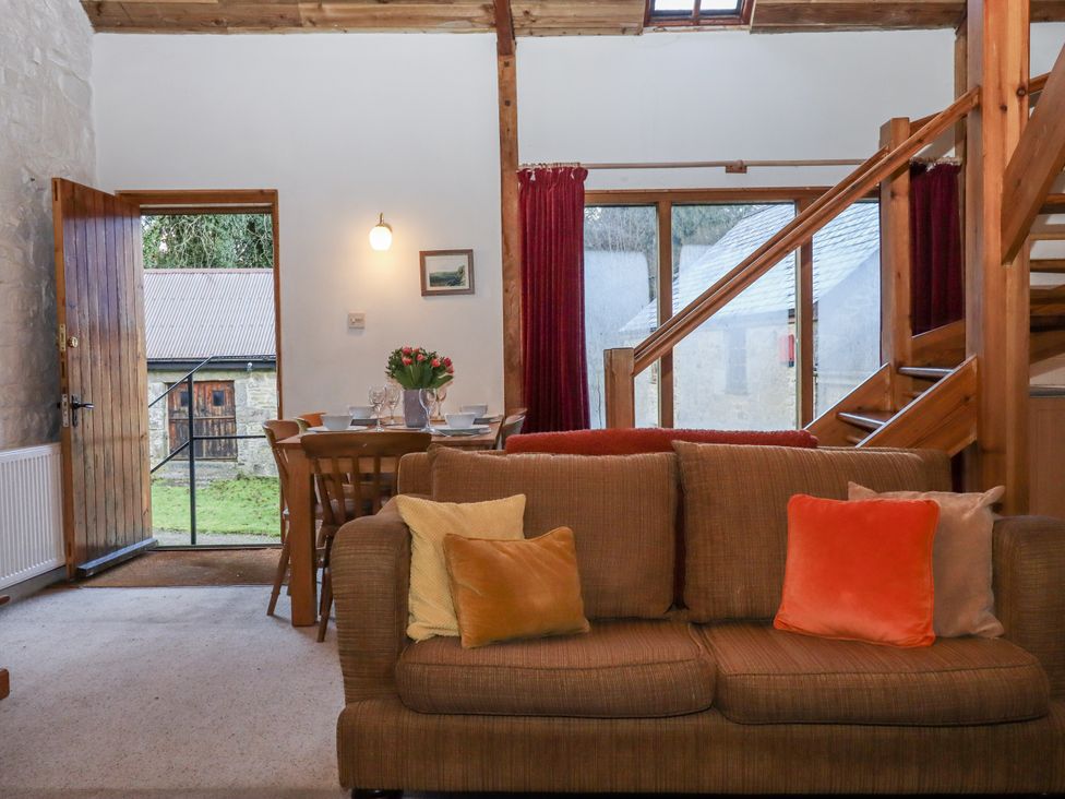 A living room with a table and chairs at Swallows Nest Widecombe-in-the-Moor near Postbridge