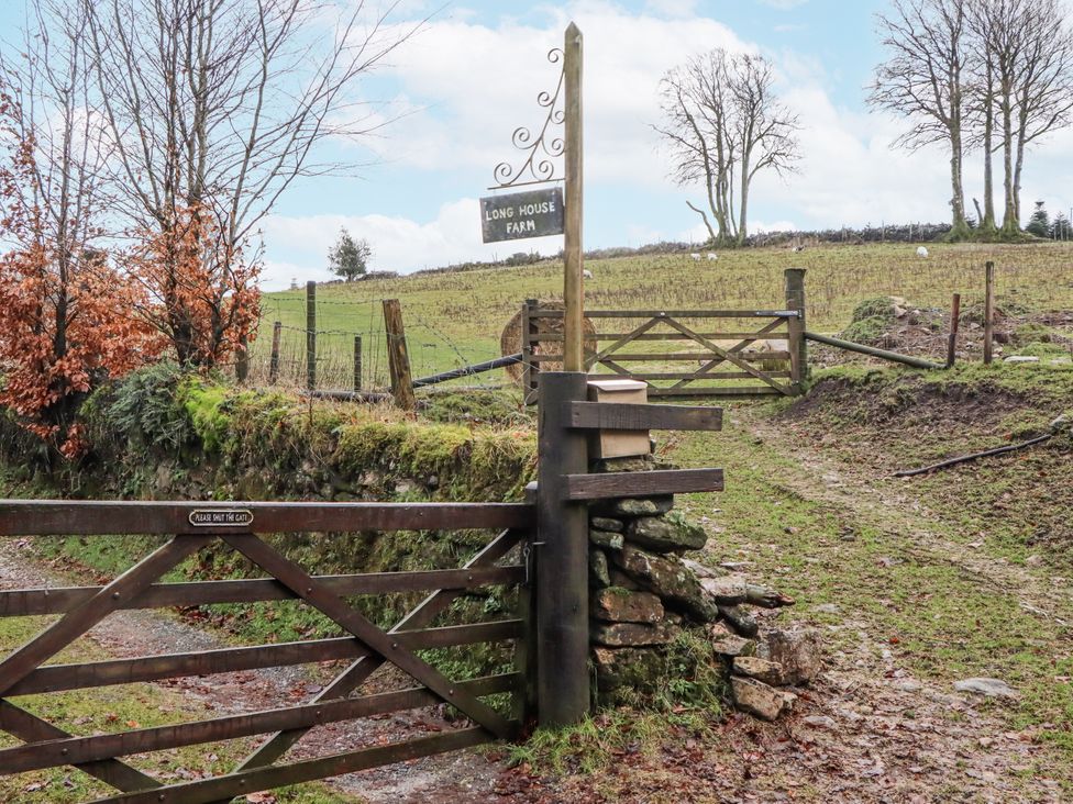 A gate with a sign at Long House Farm in Widecombe-in-the-Moor near Postbridge