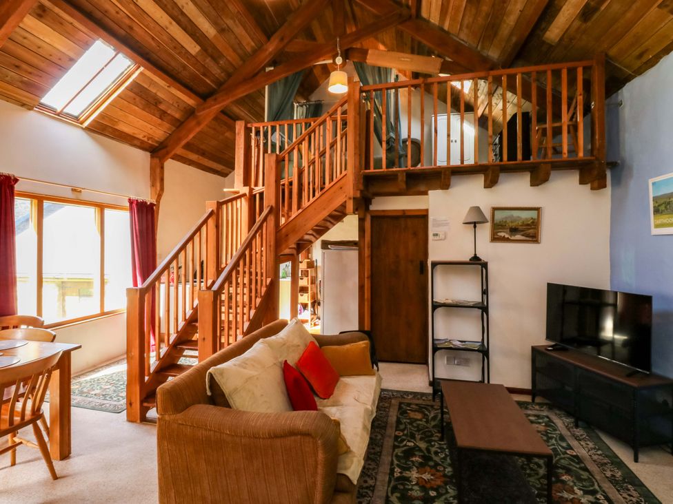 A living room featuring a sofa and coffee table at Swallows Nest in Widecombe-in-the-Moor near Postbridge