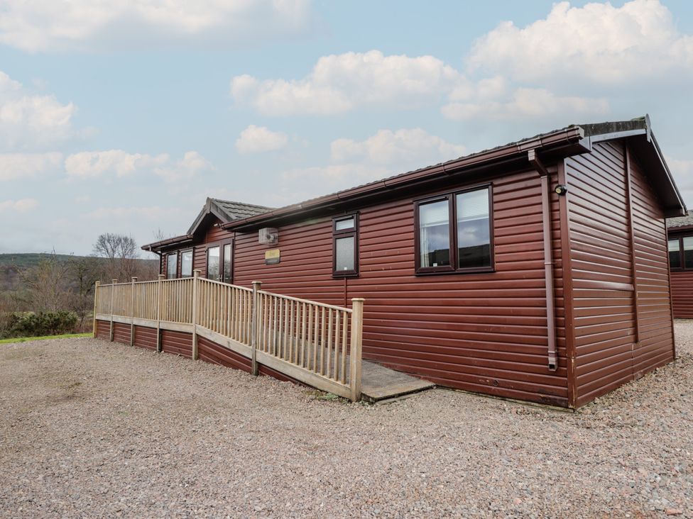 A cabin with a front porch at Monach 2 Fort William