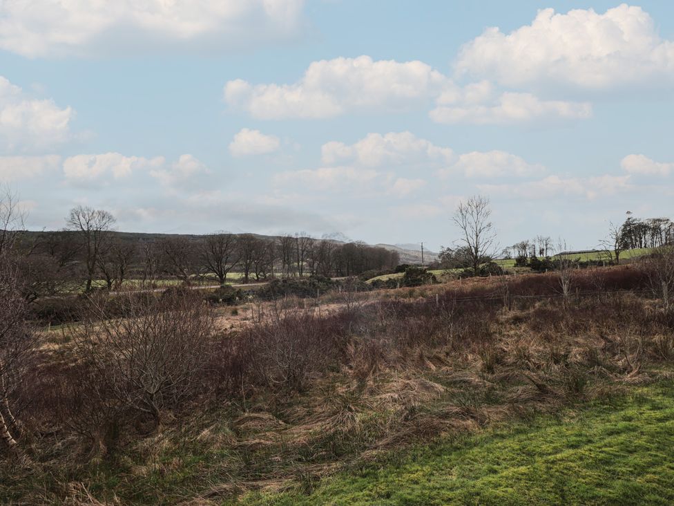 A landscape with trees and grass at Monach 3 Fort William