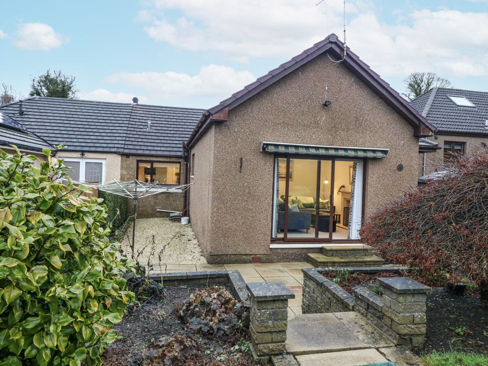 A house with a garden and steps at Cairndhu in Bossiney