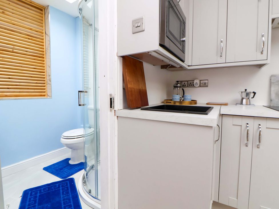 A bathroom with toilet and shower at Skylights in Chester