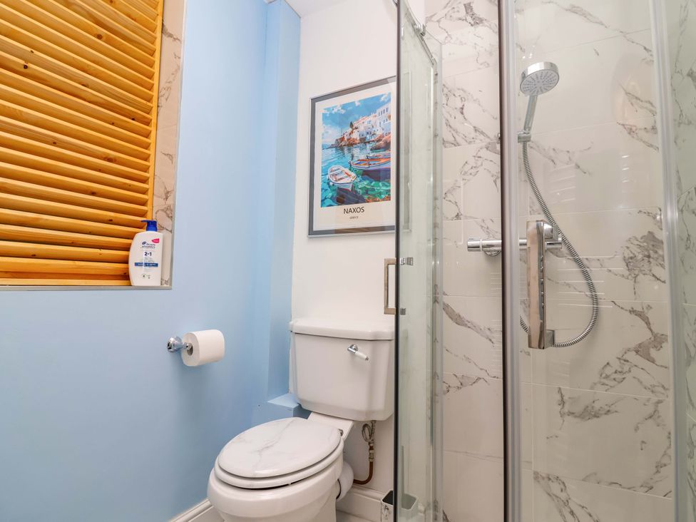 A bathroom with a shower and toilet at Skylights in Hoole