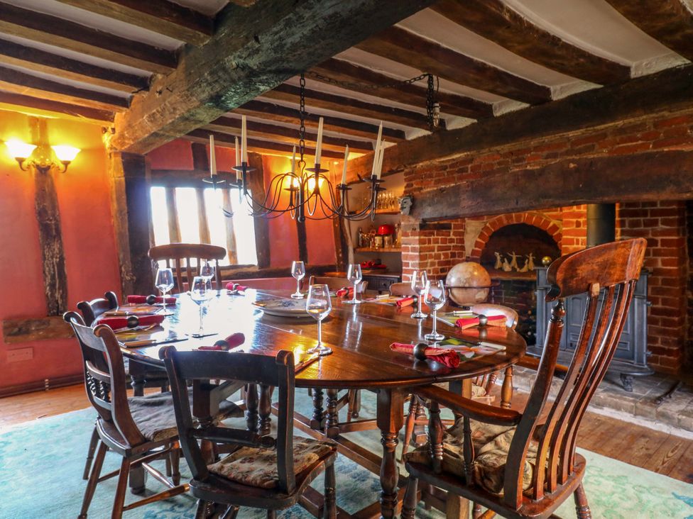 A dining room with a large table and chairs at Town Farm