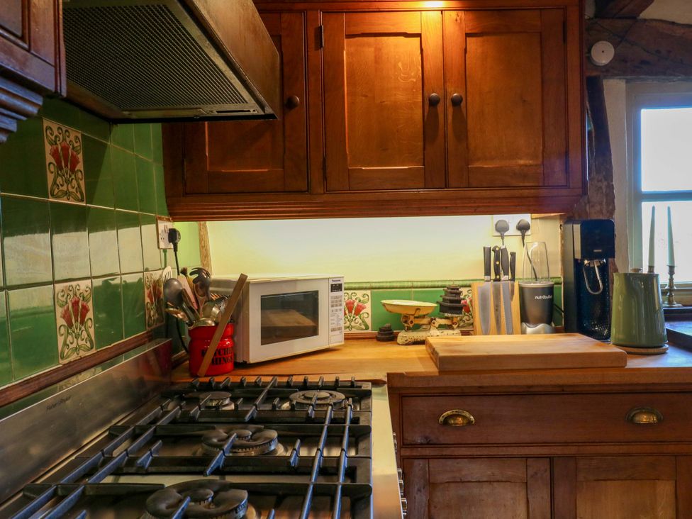 A kitchen with appliances and utensils at Town Farm