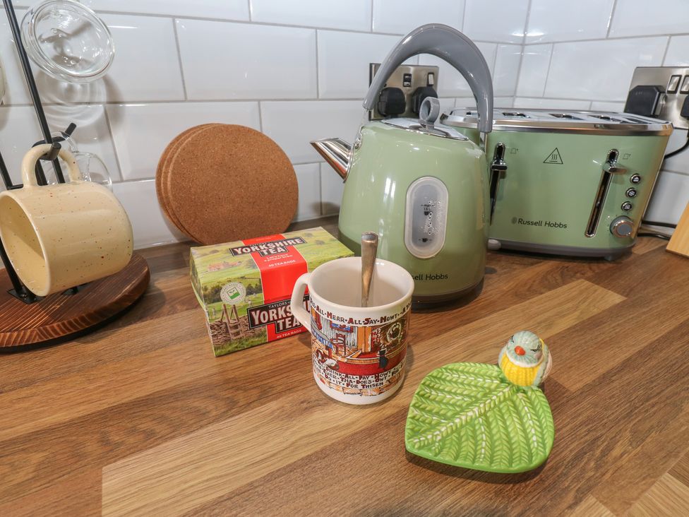 A kettle, toaster, and tea box in the kitchen at Underview in Jackson Bridge
