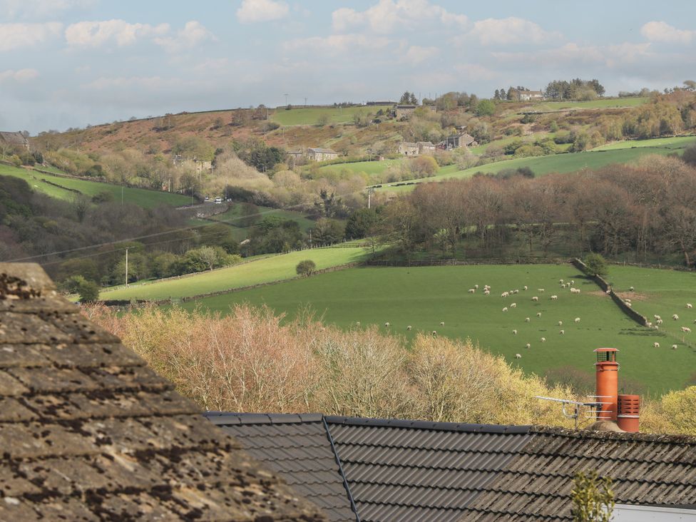 A landscape view with hills and sheep at Underview in Jackson Bridge