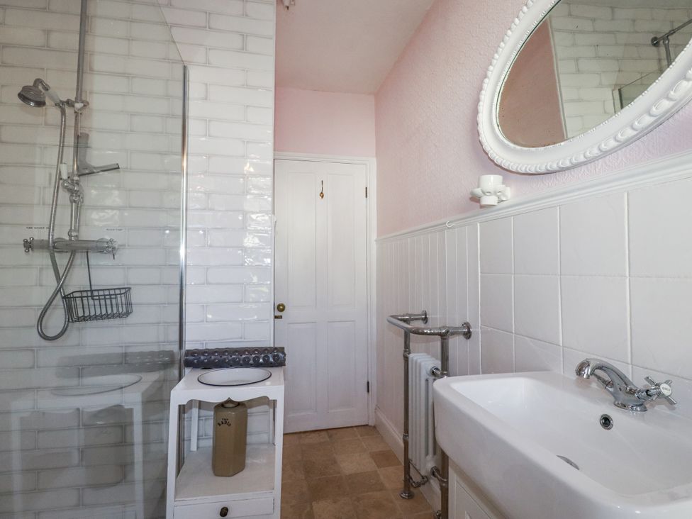 A bathroom with a shower and sink at Rosedale in St. Ives