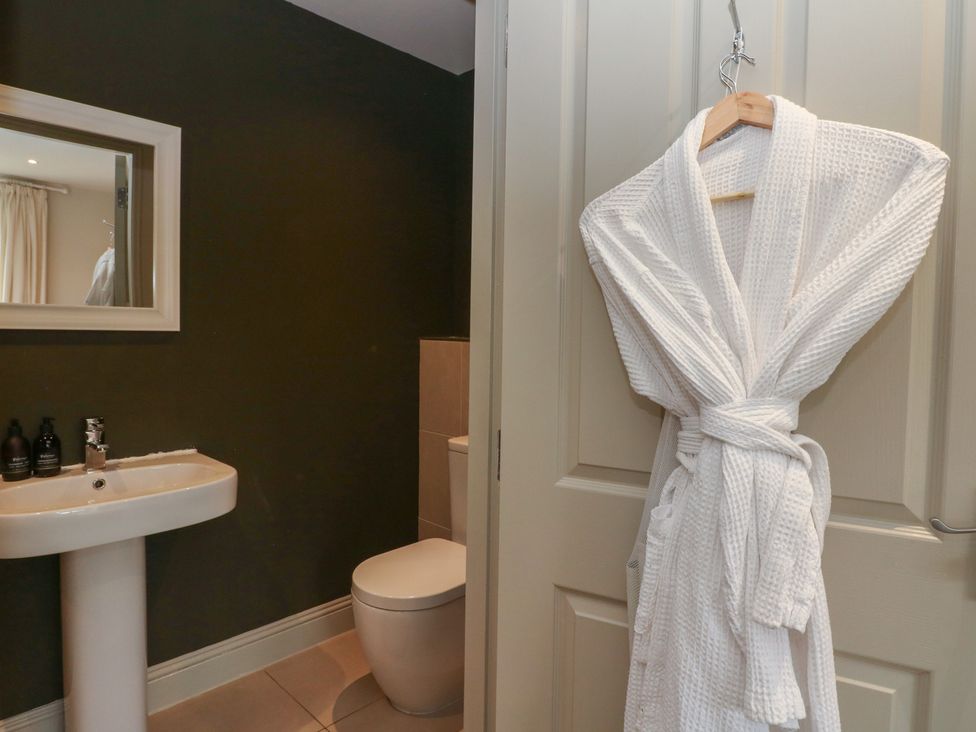 A bathroom with a sink and toilet at Glen Lochay Lodge in Killin