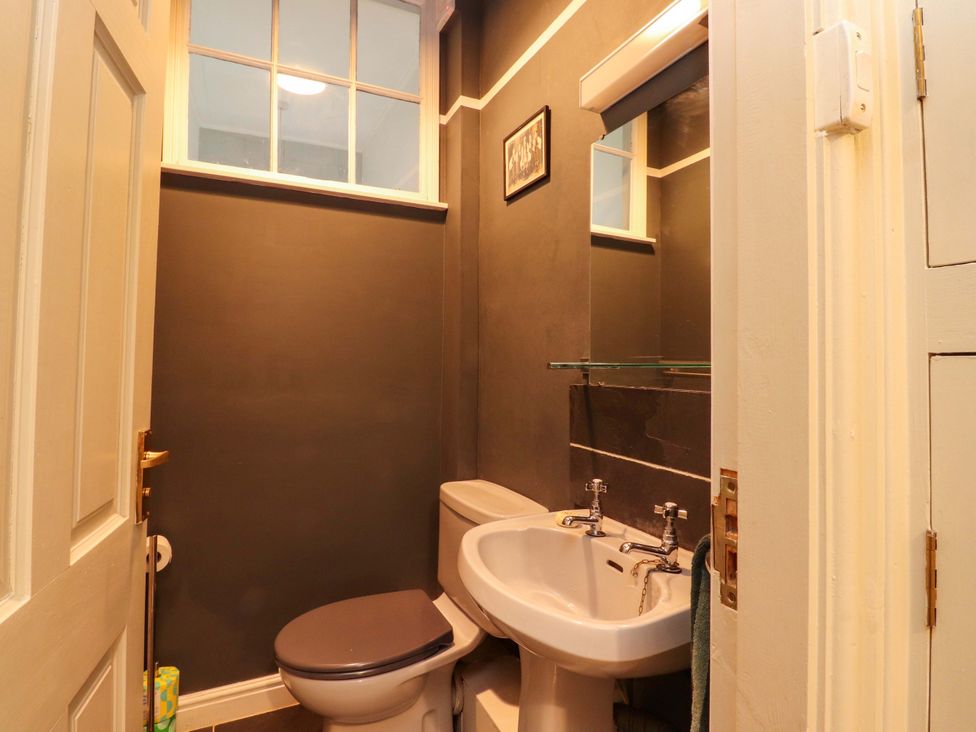 A bathroom with a sink and toilet at Devonshire House in Settle