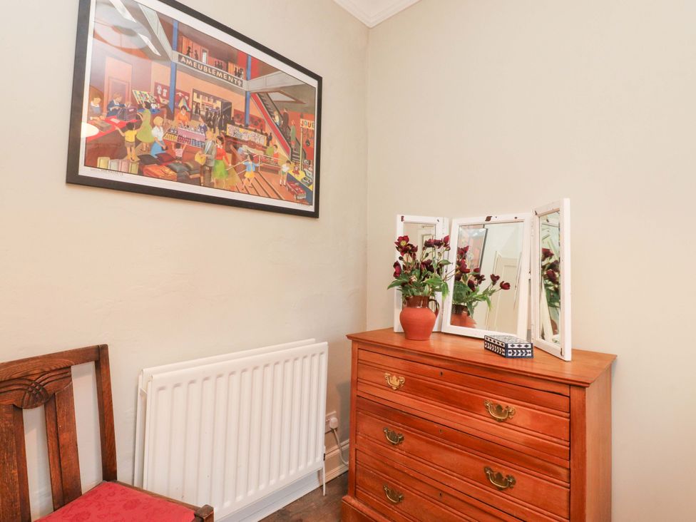 A dressing room with a dresser and mirrors at Devonshire House in Settle