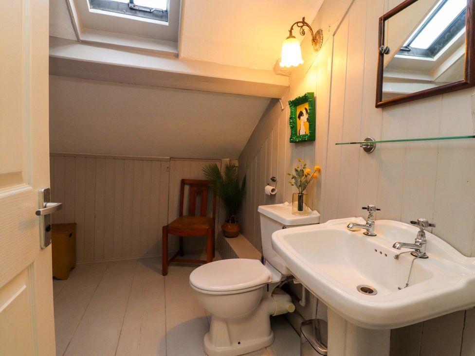 A bathroom with toilet and sink at Devonshire House in Settle