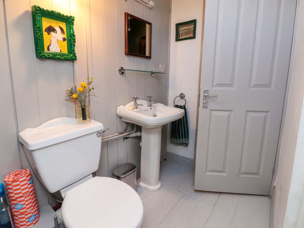 A bathroom with a sink and toilet at Devonshire House in Settle