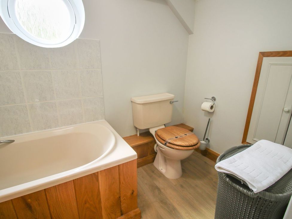 A bathroom featuring a bathtub and toilet at 1 Clarkes Lane St Martins
