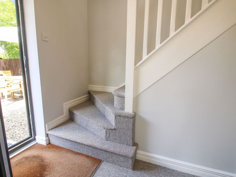A staircase leading to upper floors at 1 Clarkes Lane St Martins