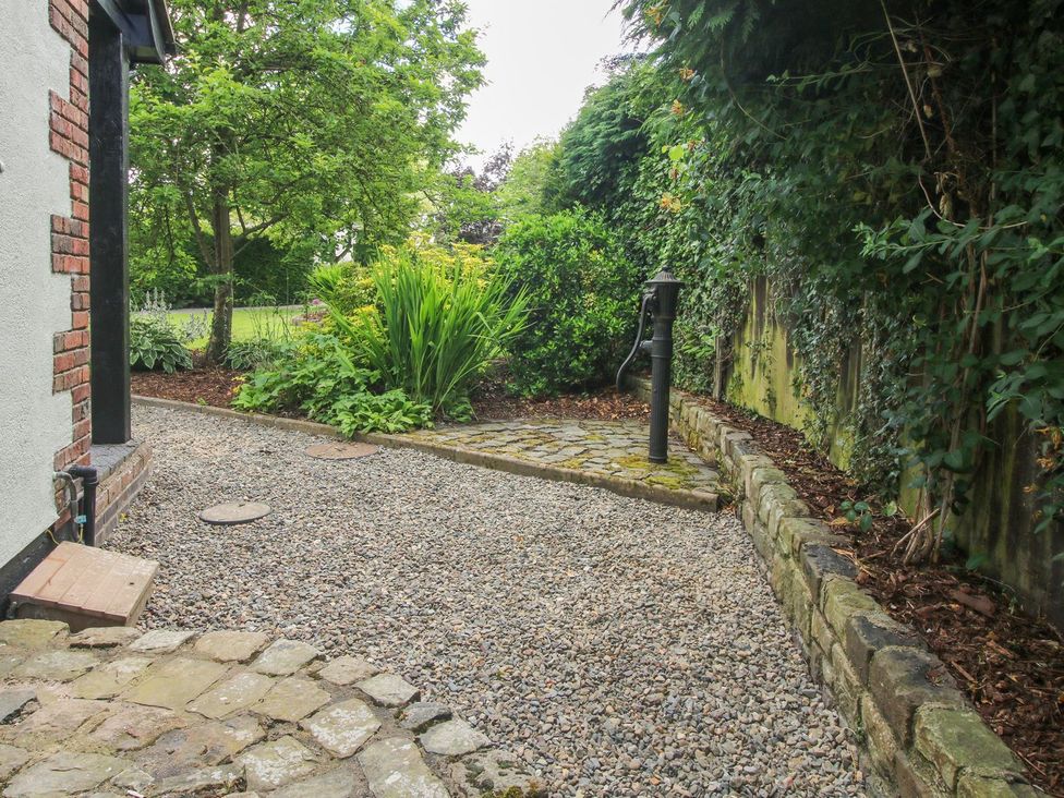 A garden with gravel pathway and plants at 1 Clarkes Lane St Martins