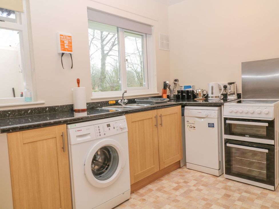 A kitchen with appliances and countertops at Orchard End in Launceston