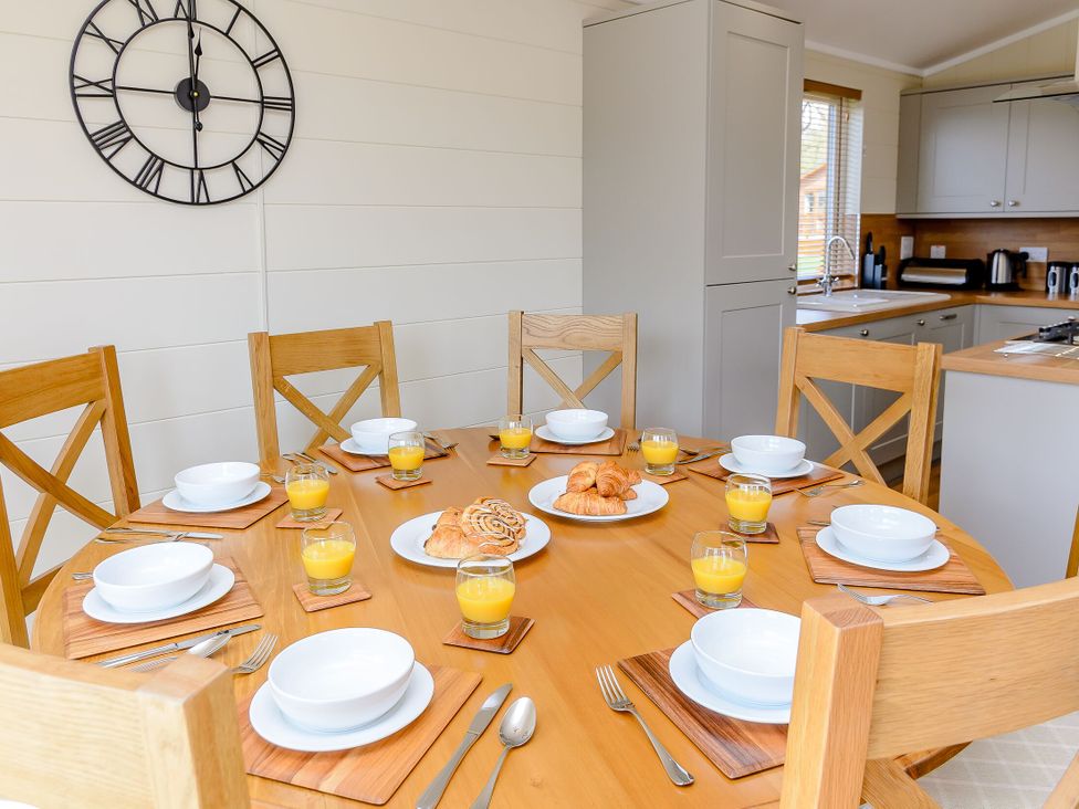 A dining room with a table set for breakfast at The Nassington (Pet) Kings Cliffe
