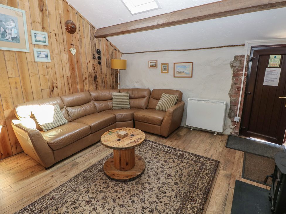A living room with a sofa and coffee table at Ramsgrove in Pilton