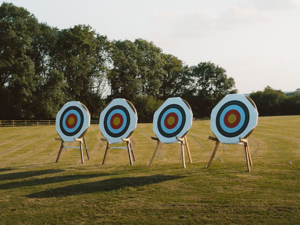 Four archery targets in an outdoor area at The Yarwell in Kings Cliffe