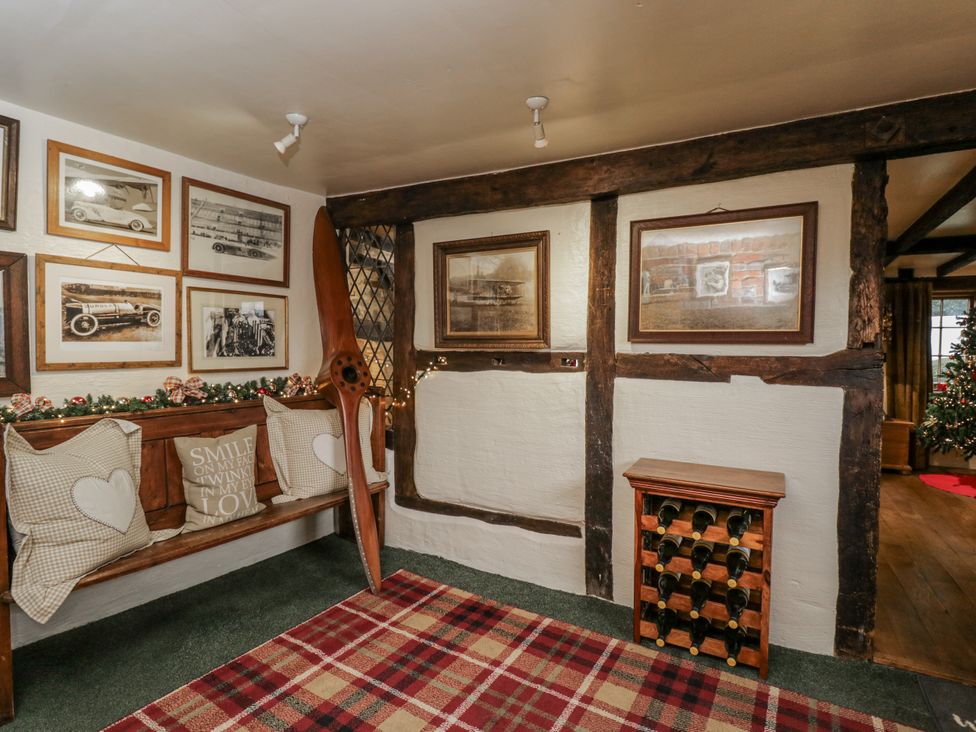 A snug with a bench and wine rack at 24 Eastcourt