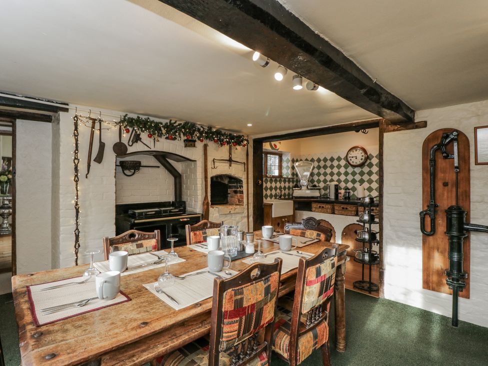 A dining room with a table and chairs at 24 Eastcourt 