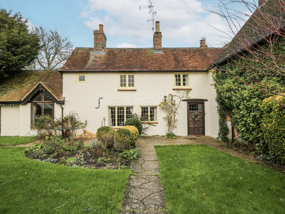 A house with a pathway and garden at 24 Eastcourt in 