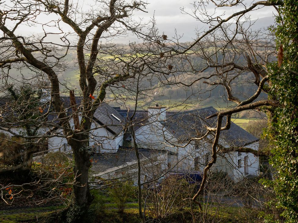 A landscape with houses and trees at Ty Uchaf in Colwyn Bay