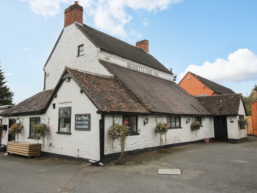 A building with signage at Bennetts End Inn in Clee Hill