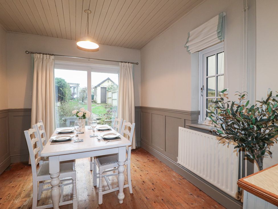 A dining room with table and chairs at Little Launde Cottage Launde near Braunston-In-Rutland