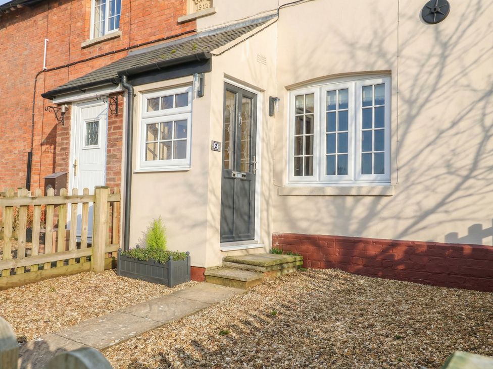 An outdoor area featuring a door and pathway at Little Launde Cottage in Launde near Braunston-In-Rutland