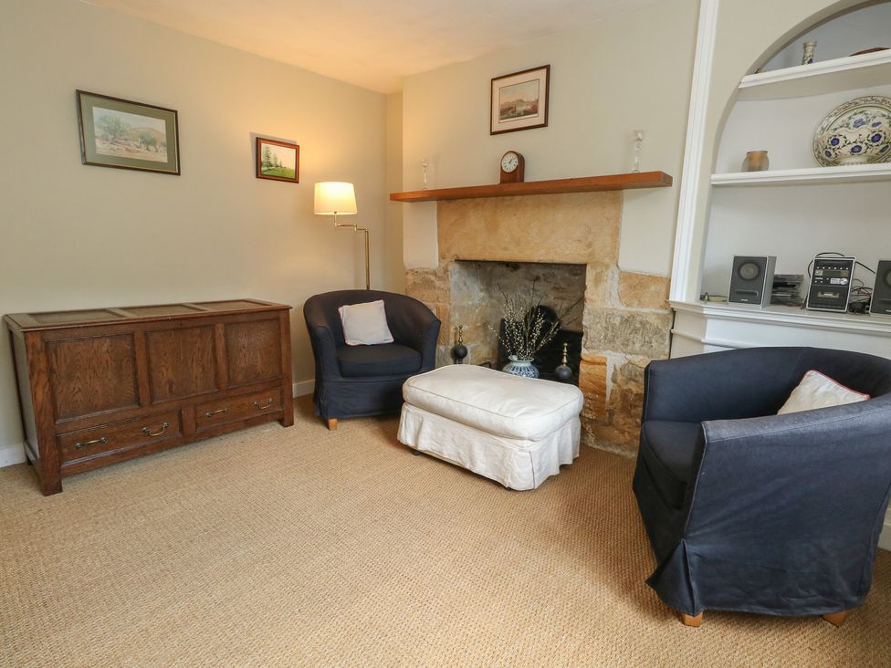 A living room with a sofa and armchairs at Crantock