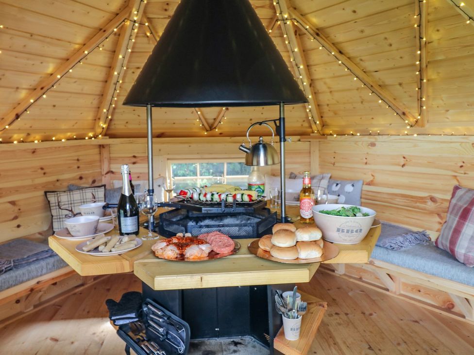 A kitchen with a grill and food items at Lake View in Crediton